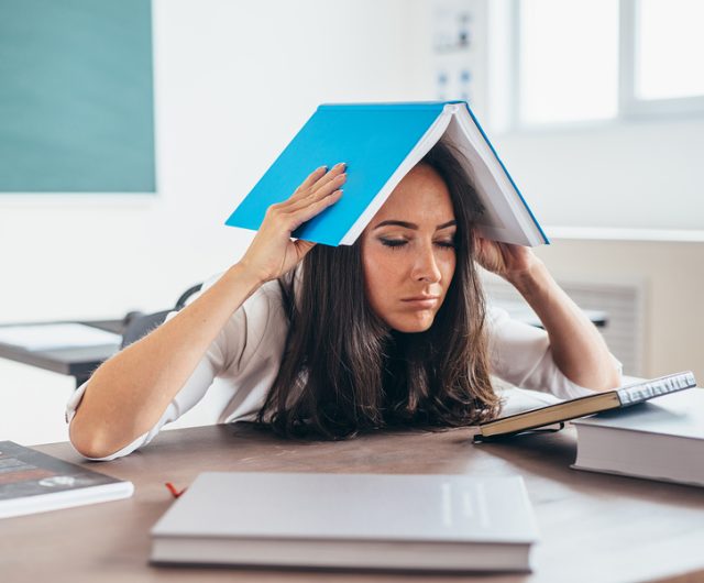 bigstock Tired Woman Sitting At The Tab 252363364