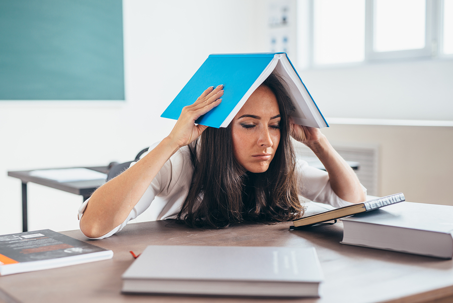 bigstock Tired Woman Sitting At The Tab 252363364