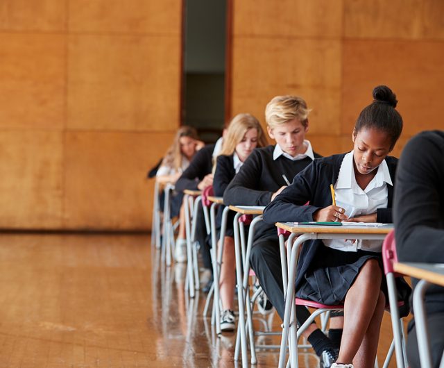 bigstock Teenage Students In Uniform Si 217487401