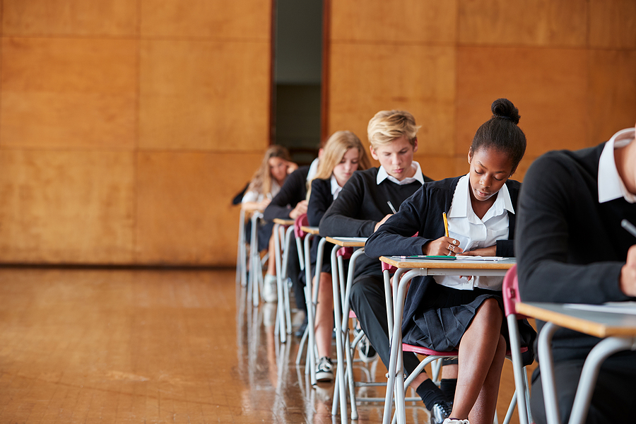 bigstock Teenage Students In Uniform Si 217487401